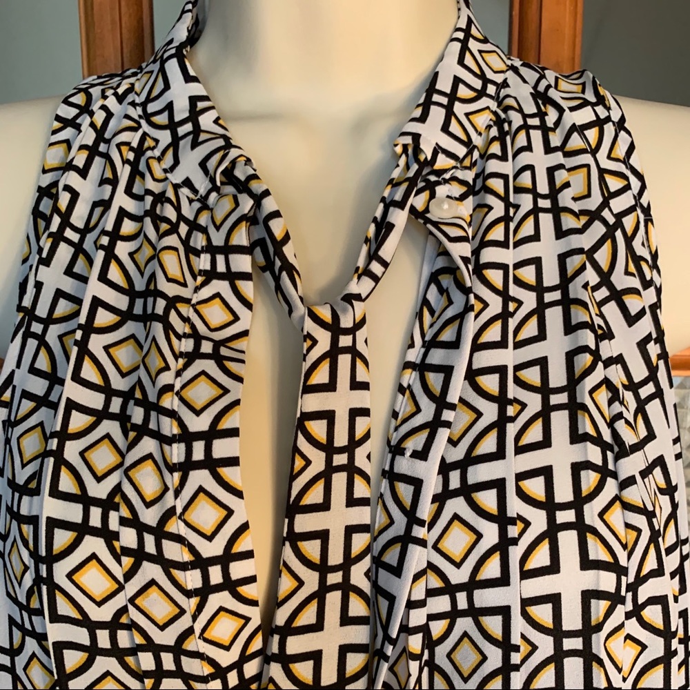 Sleeveless graphic pattern bow shirt